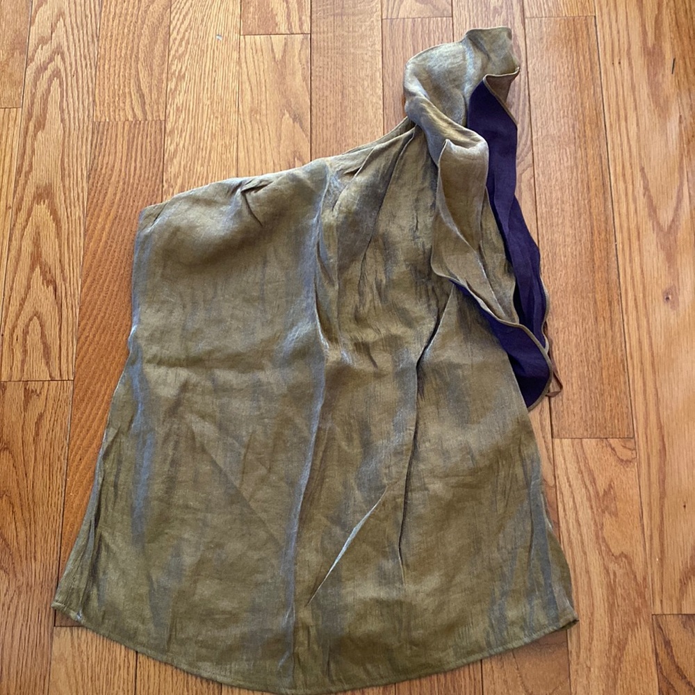 Limited. One shoulder women’s top. Size large. Gold